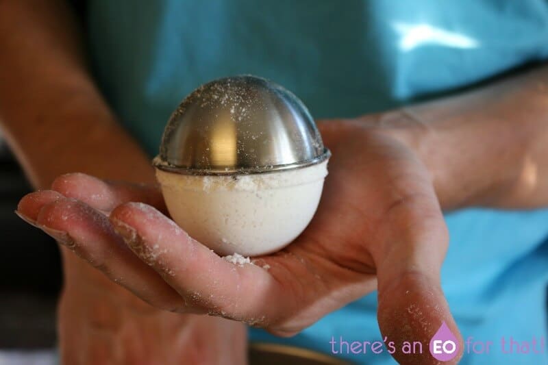 How to mold homemade bath bombs.